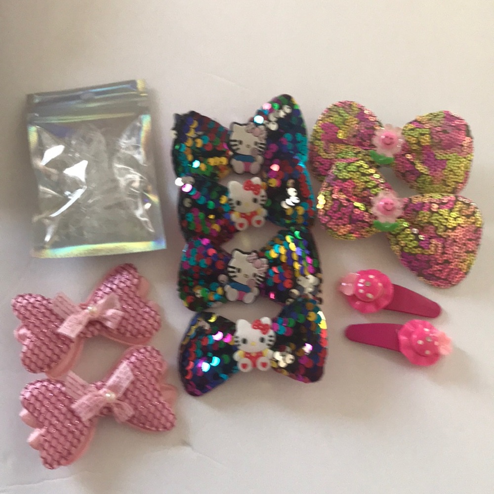 🐱Hello kitty Bow 🐱🎀 with assorted other bows for Girls
